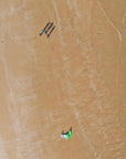 Drones birds eye view of a kitesurfing lesson in progress.