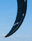 A black Ozone Chrono V4 kitesurfing and foil kite.
