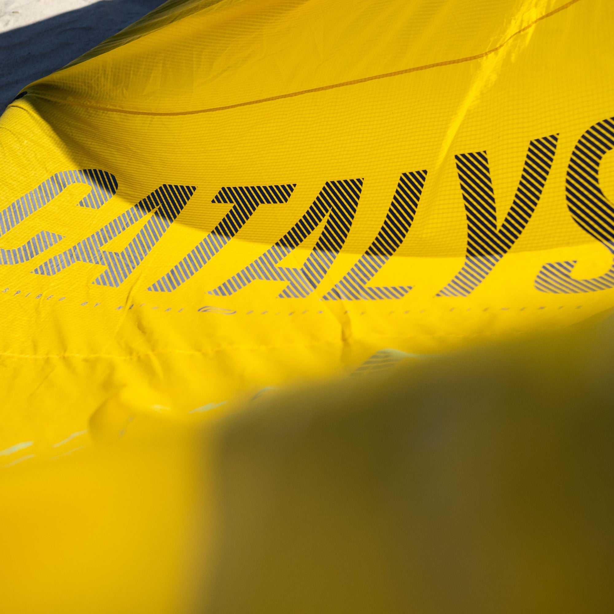 A close up of the yellow Ozone Catalyst V3 canopy.