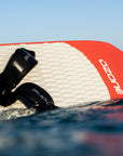 Ozone Apex V1 kitesurfing foil board in the water with straps on.